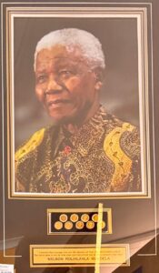 {je_artwork_artwork_medium_id}  {je_artwork_artwork_category_id} titled Mandela Courage/Coins